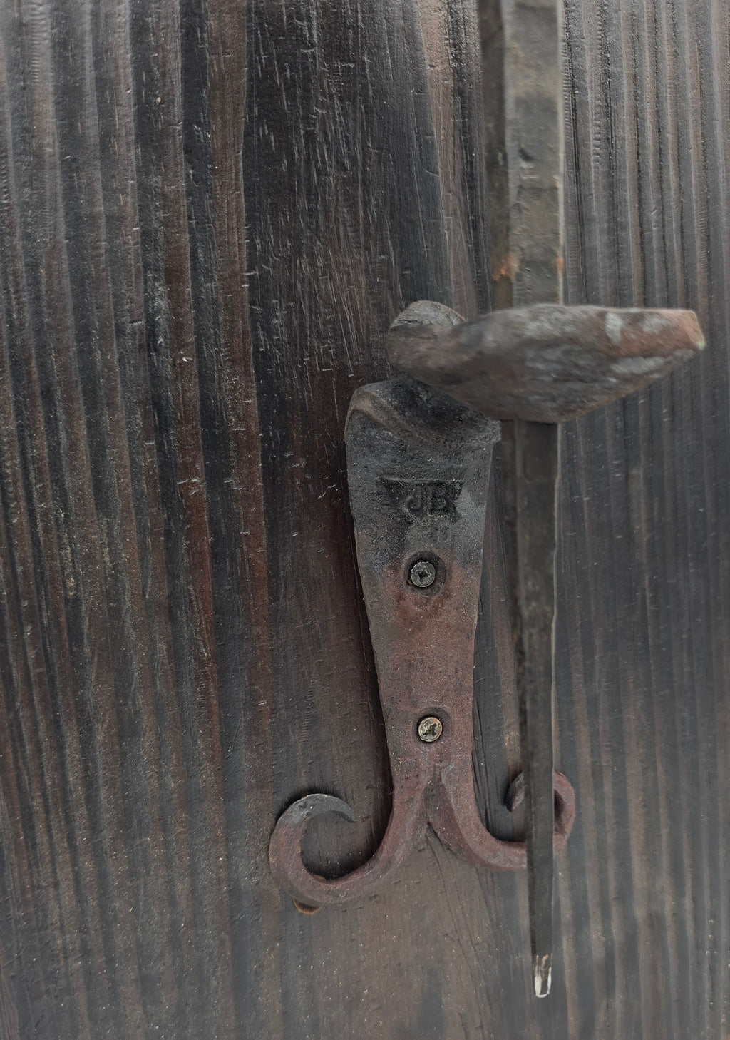 Railroad spike cross with wall mount