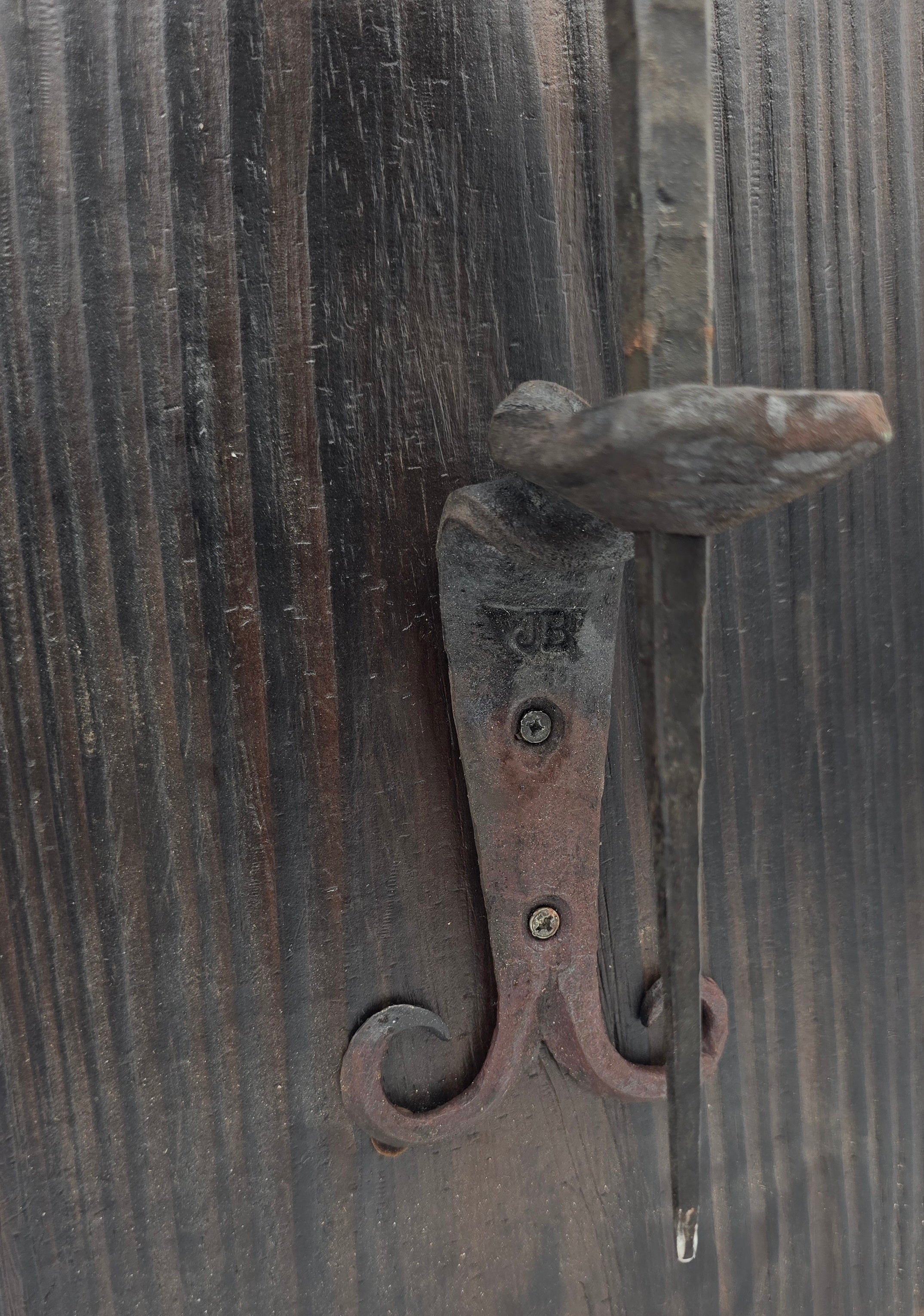 Railroad spike cross with wall mount